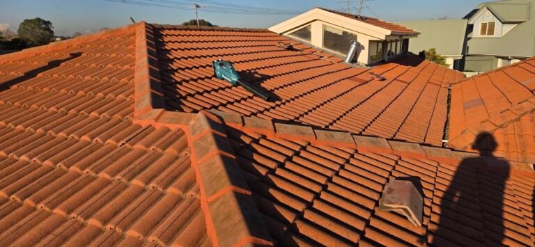 Completed ridge capping repoint on a tiled roof in Hillside