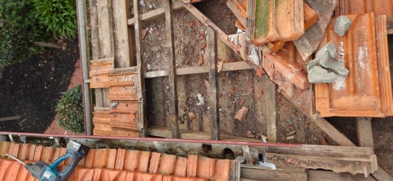 Overhead view of exposed battens and roof tiles during roof repairs in Essendon
