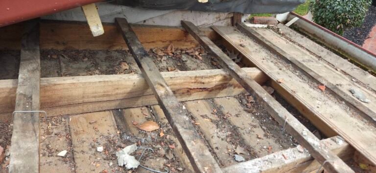 Exposed roof battens with tiles removed during roof repairs in Essendon